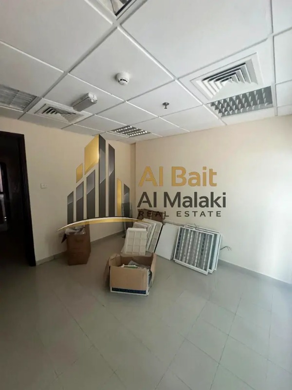 Office for rent in Al Qasba, a very beautiful commercial building, prime location close to all vital centers, free air conditioning. photo 2